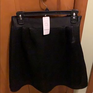NWT Bebe black mesh circle skirt